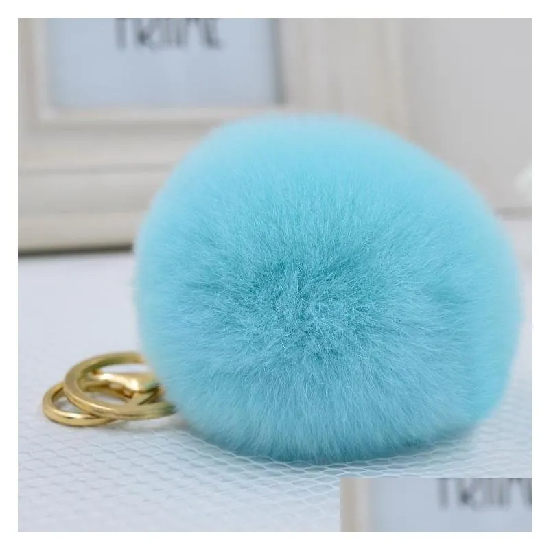 keychains wholesales 17 color fluffy fur pompom keychain women bag charm real natural balls genuine pom poms key chain f252 emel22