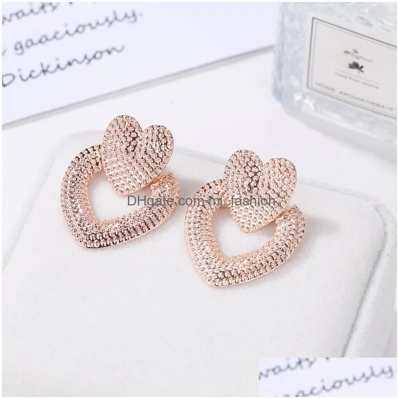 fashion jewelry heart earrings hollowed metal double peach heart stud earrings