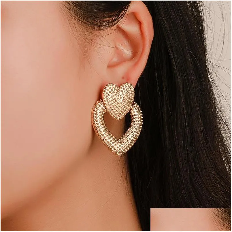 fashion jewelry heart earrings hollowed metal double peach heart stud earrings