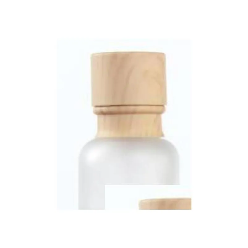 frosted glass jar lotion cream bottles round cosmetic jars hand face lotion pump bottle with wood grain cap bottles round cosmeti