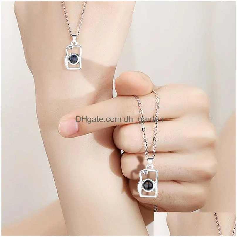 hot selling couple magnetic attraction necklace sun moon love splicing projection 100 languages i love you pendant necklace