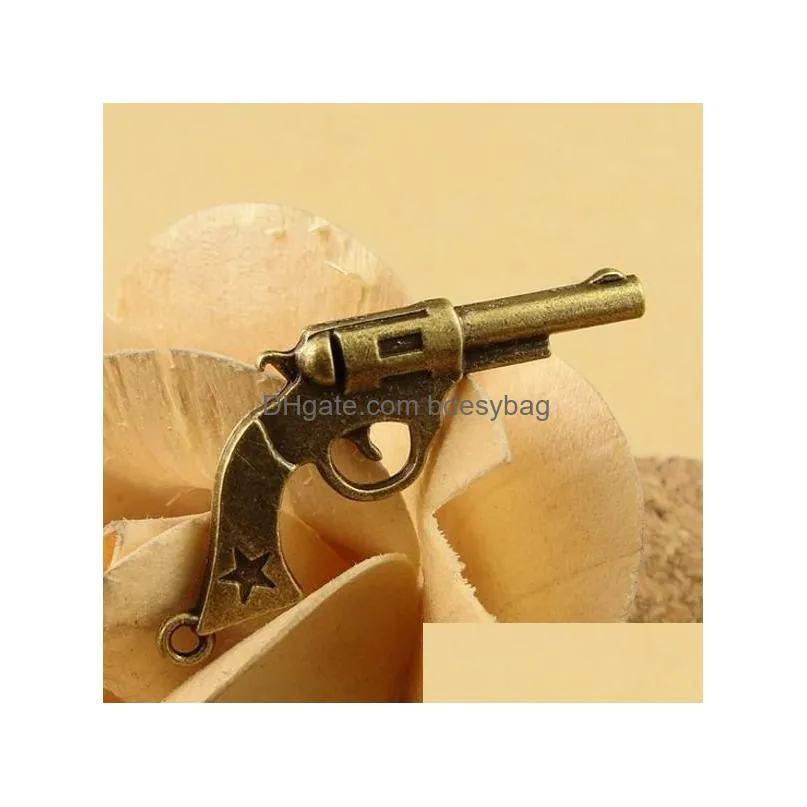 120 pcs 35x20mm antique brass gun charms pendant western  gun charm pistol gun charm revolver vintage style jewelry