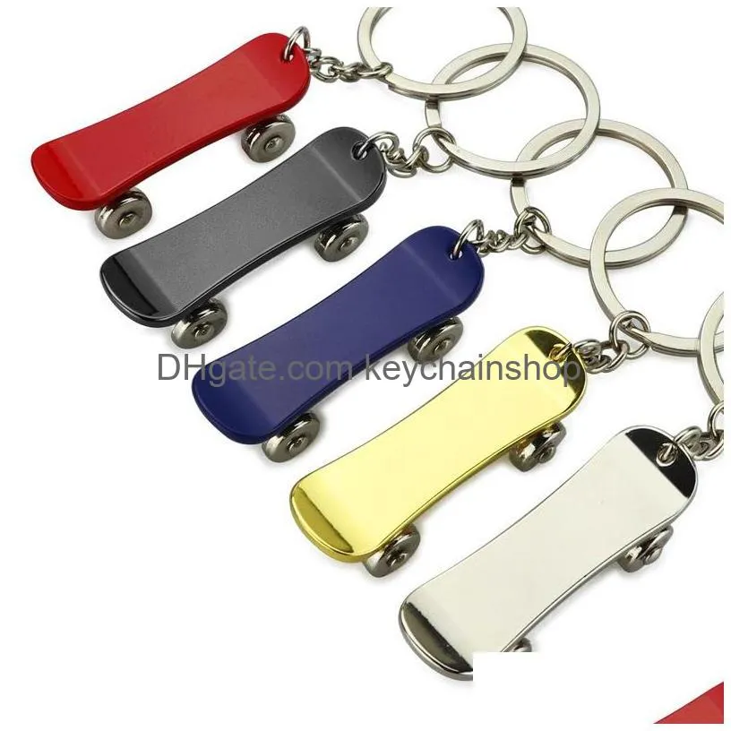 fashion rotatable skateboard keychain metal keyrings skateboard pendant handbag hangs key holders fashion jewelry will and sandy gift 629