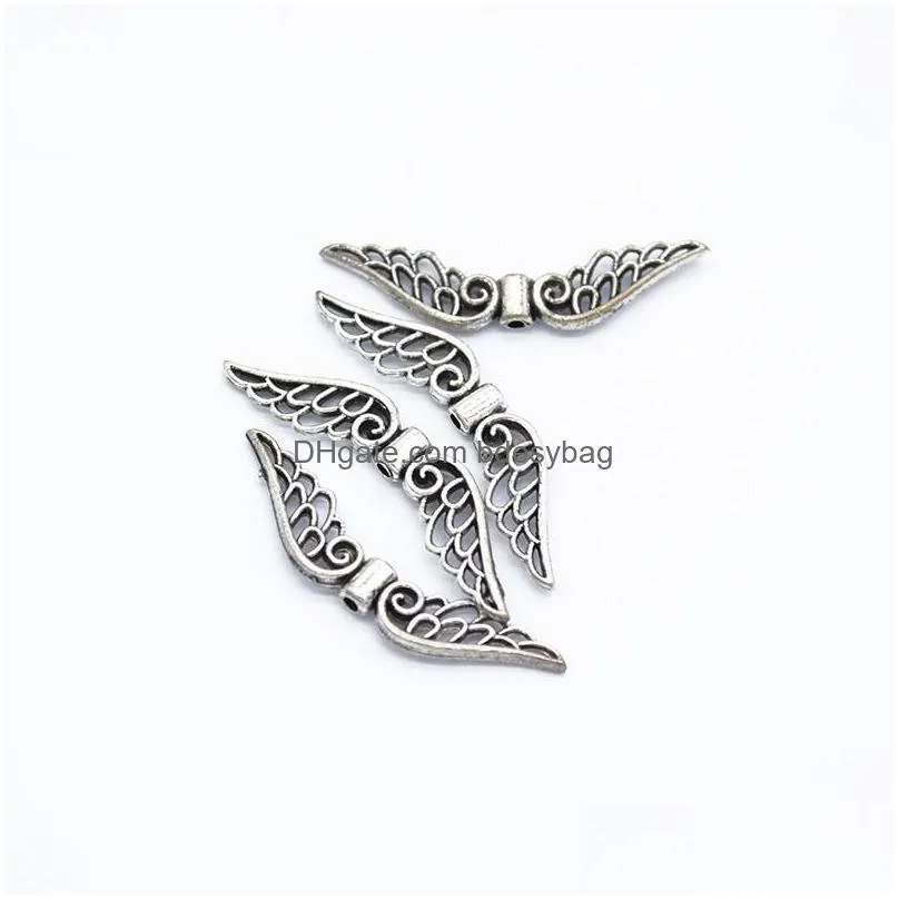 bulk package 500pcs assorted colors angel wing spacer charm beads for diy jewelry making findings shipping