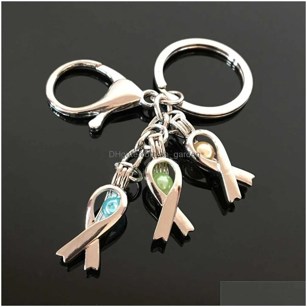 euramerican seahorse pearl cage key ring can open hollow noctilucent volcanic stone pendant keyring