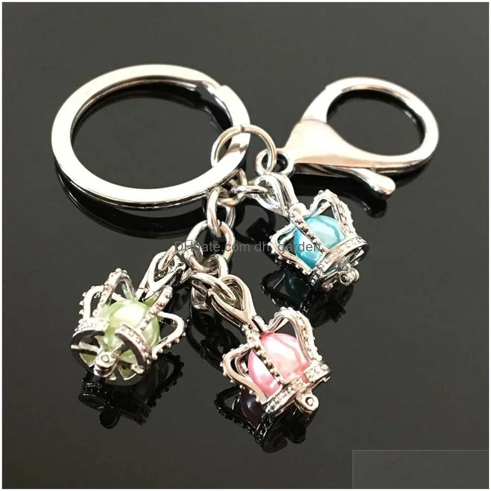 euroamerican paw print pearl cage key ring can open hollow noctilucent volcanic stone pendant keyring