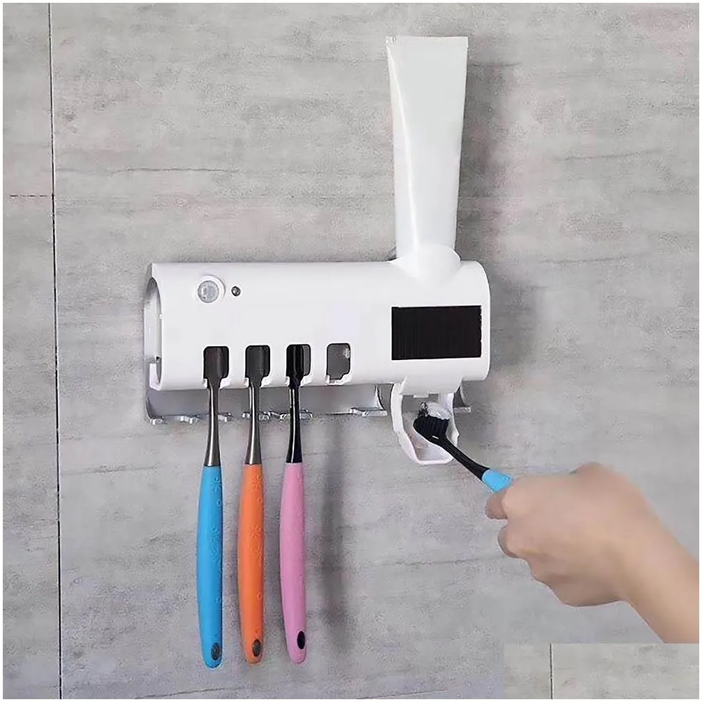 automatic toothpaste squeezer dispenser antibacteria ultraviolet toothbrush holder sterailizer bathroom accessories solar energy