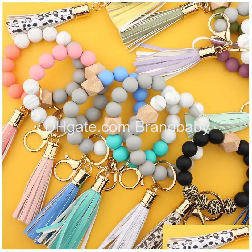 3 colors silicon beads bracelets link tassel with one wooden bead design jewelry bracelet good quality key chain charm birthday gifts