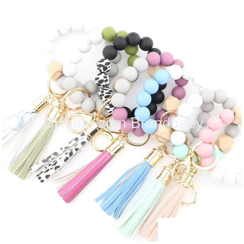 3 colors silicon beads bracelets link tassel with one wooden bead design jewelry bracelet good quality key chain charm birthday gifts