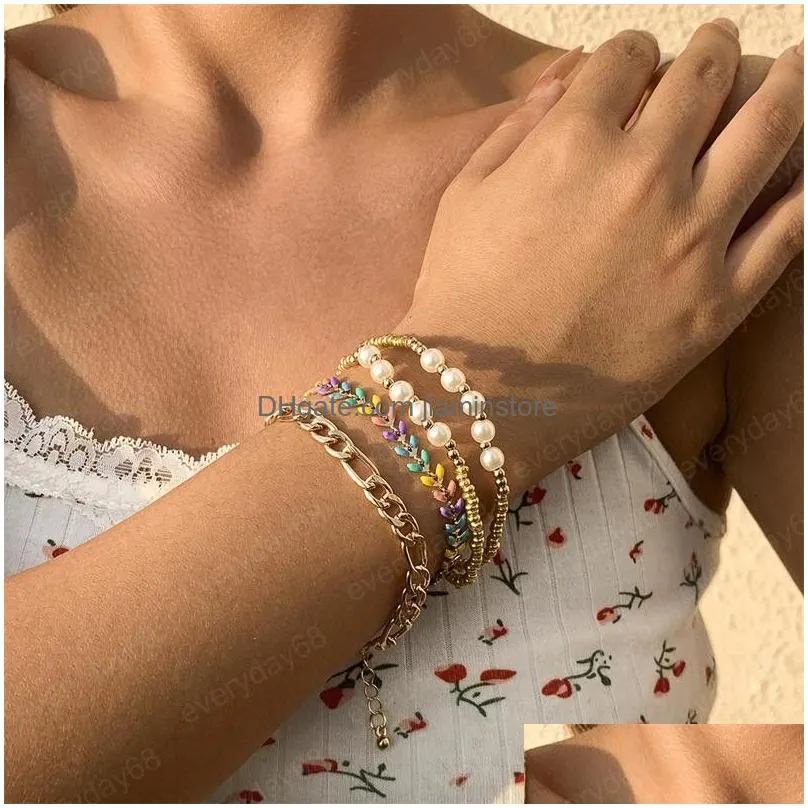 yamog women imitation pearl beaded strands bracelets retro alloy wheat model splicing hand chains european multi layer hollow out woven bracelet accessories