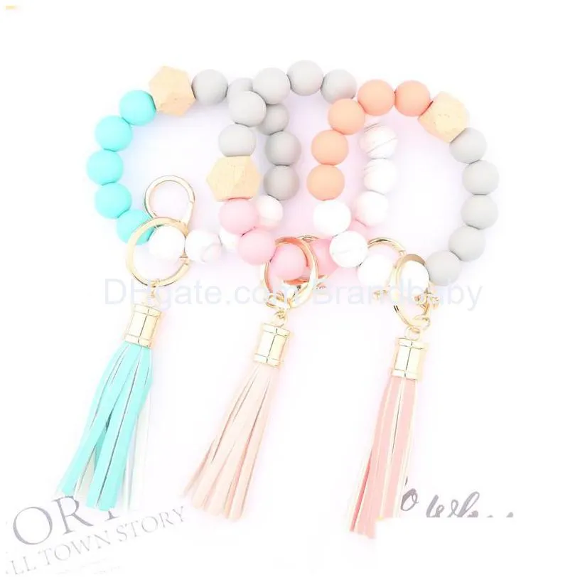 3 colors silicon beads bracelets link tassel with one wooden bead design jewelry bracelet good quality key chain charm birthday gifts