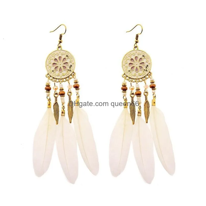 bijoux boho ethnic long feather tassel earrings for women round metal flower carved  oil diffuser ear jewelry