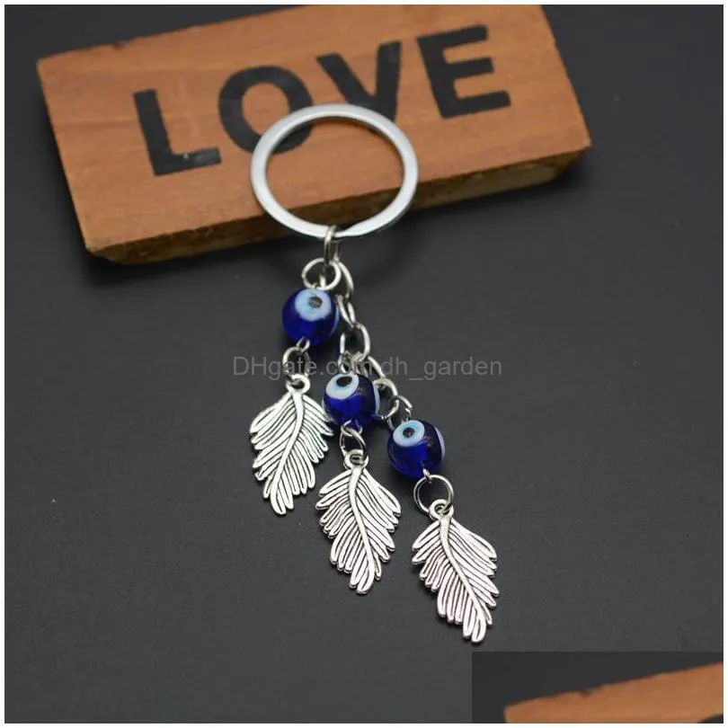 turkish evil eye keychains lucky blue eye feather tree of life charm key chain vintage keyring for men women car key pendant