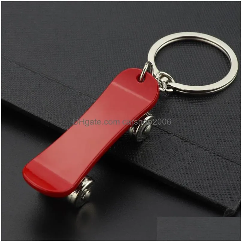 metal rotatable skateboard keychain key rings skateboard pendant handbag hangs fashion jewelry for women mens gift will and sandy 