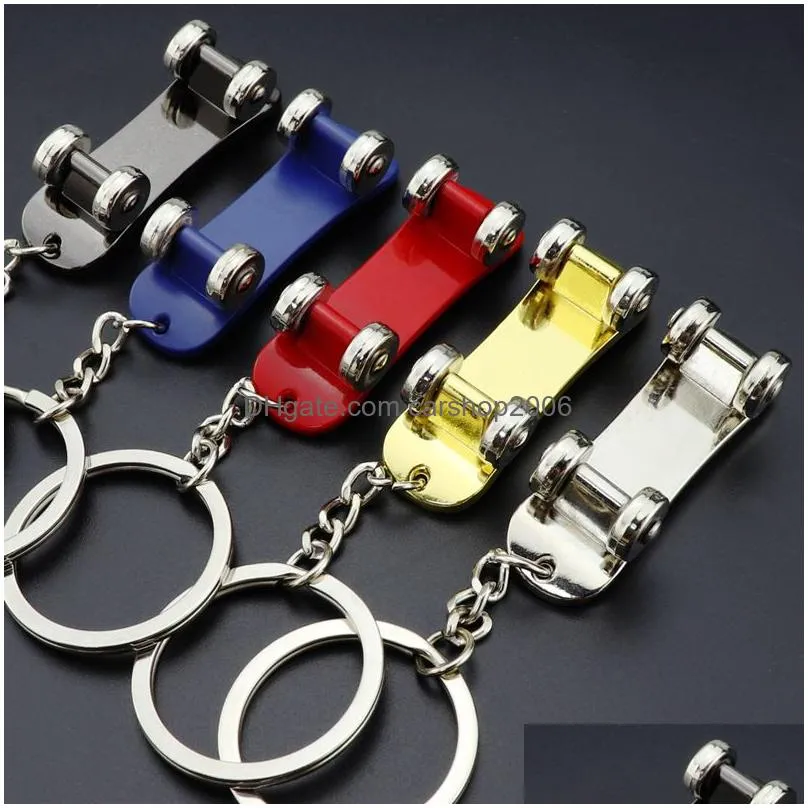 metal rotatable skateboard keychain key rings skateboard pendant handbag hangs fashion jewelry for women mens gift will and sandy 