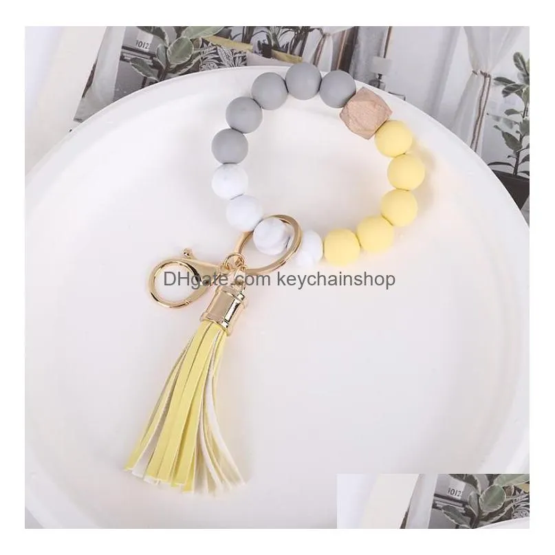 12 colors silicone beads tassel bead string bracelet keychain food grade leopard wooden beads bracelets for women girl key ring wrist