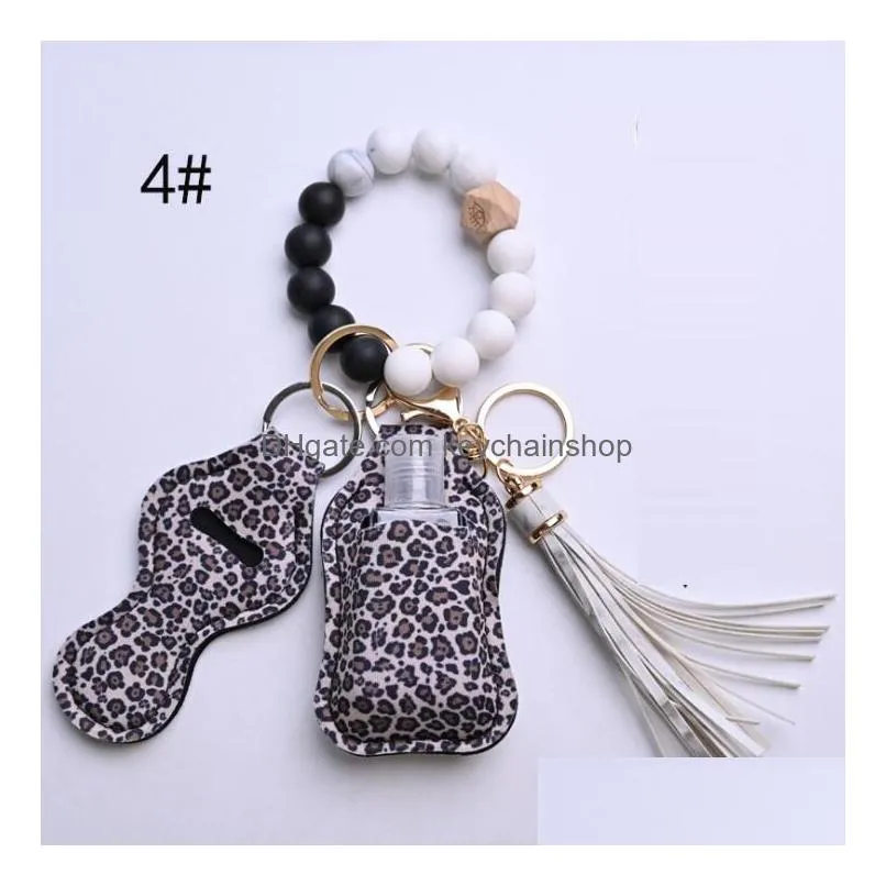 12 colors wooden tassel silicone bead string bracelet keychain bag car key chain wristband hand sanitizer holder with bottels for woment fashion