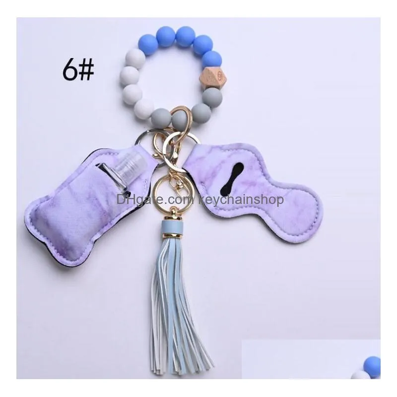 12 colors wooden tassel silicone bead string bracelet keychain bag car key chain wristband hand sanitizer holder with bottels for woment fashion