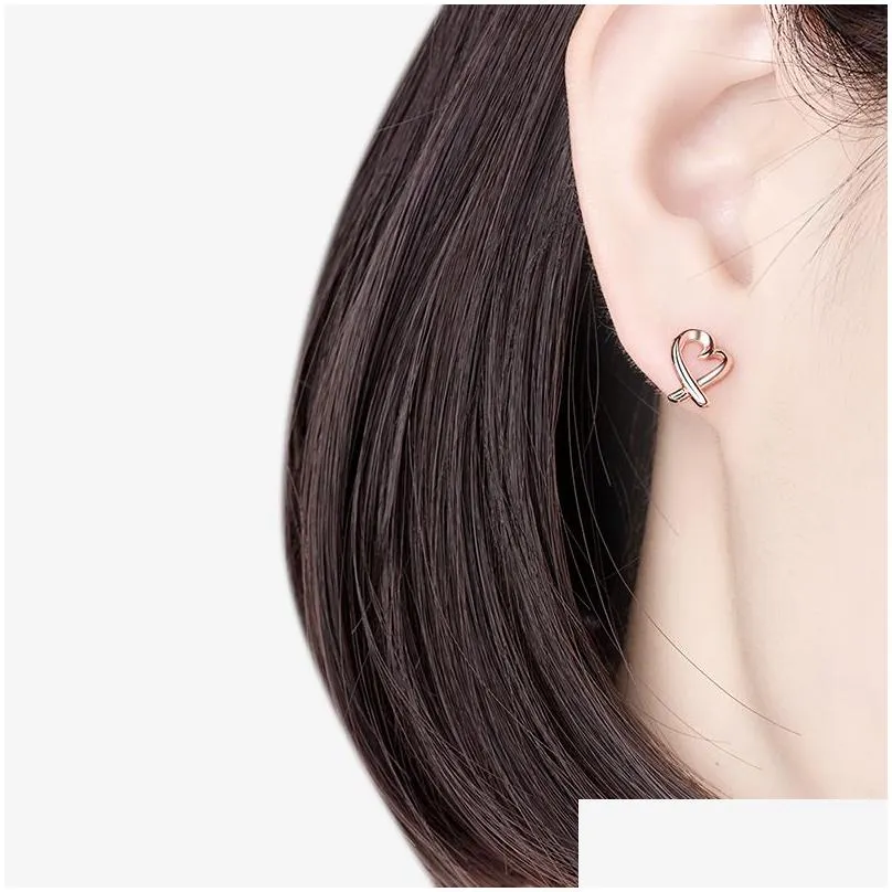 simple design silver color hollow heart dangle earrings for women new brand fashion ear cuff piercing drop earring gift