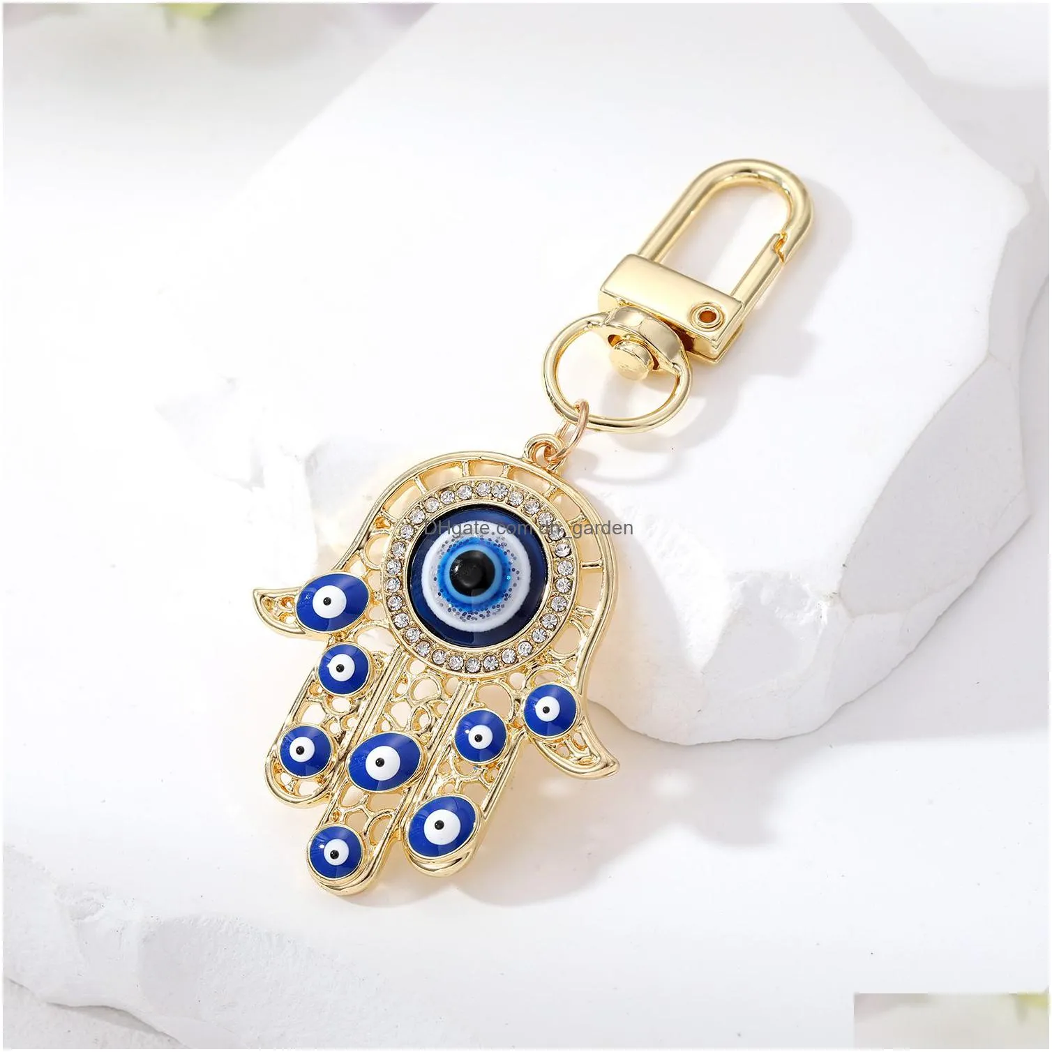 evil eye hamsa hand keychain key ring for women men hollow fatima hand blue eye bag car key accessories