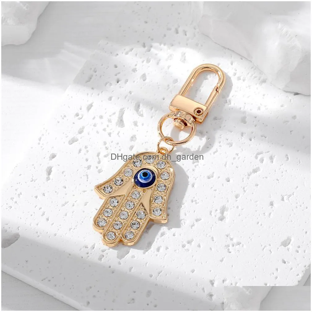 evil eye rhinestone hamsa hand keychain key ring for women men fatima hand blue eye bag car key accessories