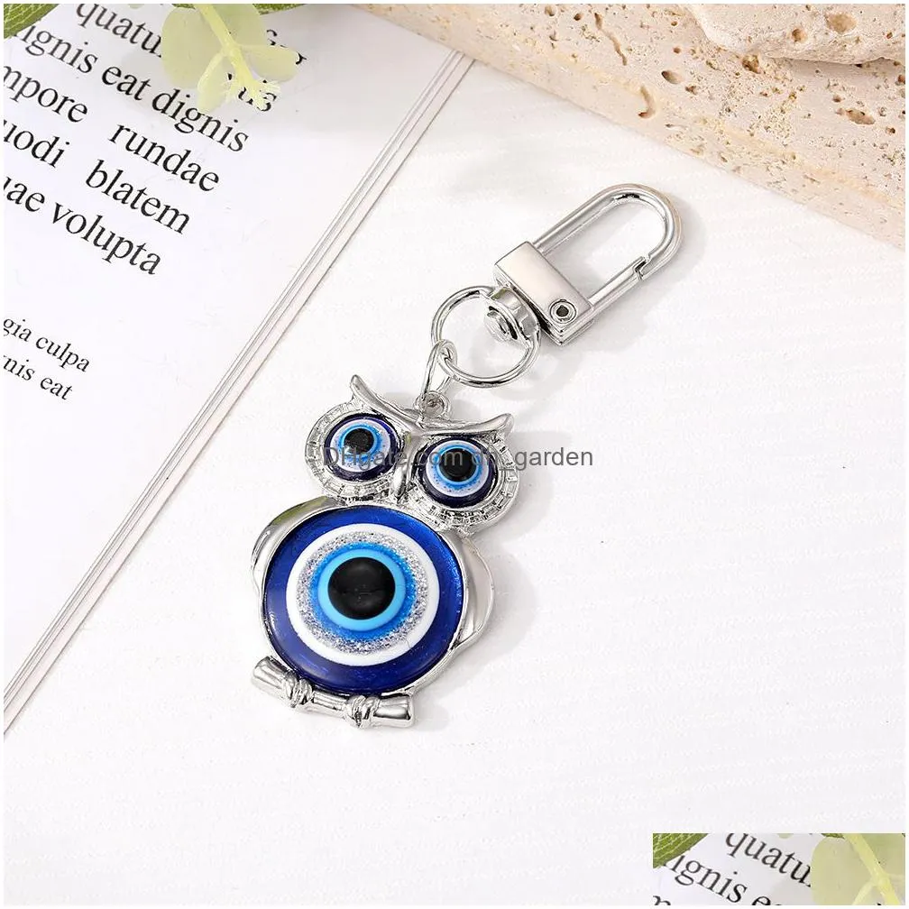 evil eye hamsa hand owl keychain key ring for women men hollow fatima hand blue eye bag car key accessories