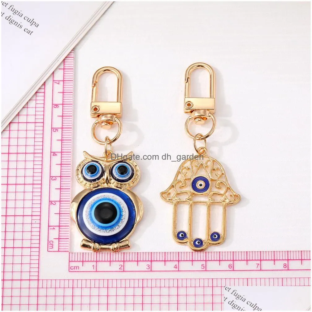 evil eye hamsa hand owl keychain key ring for women men hollow fatima hand blue eye bag car key accessories