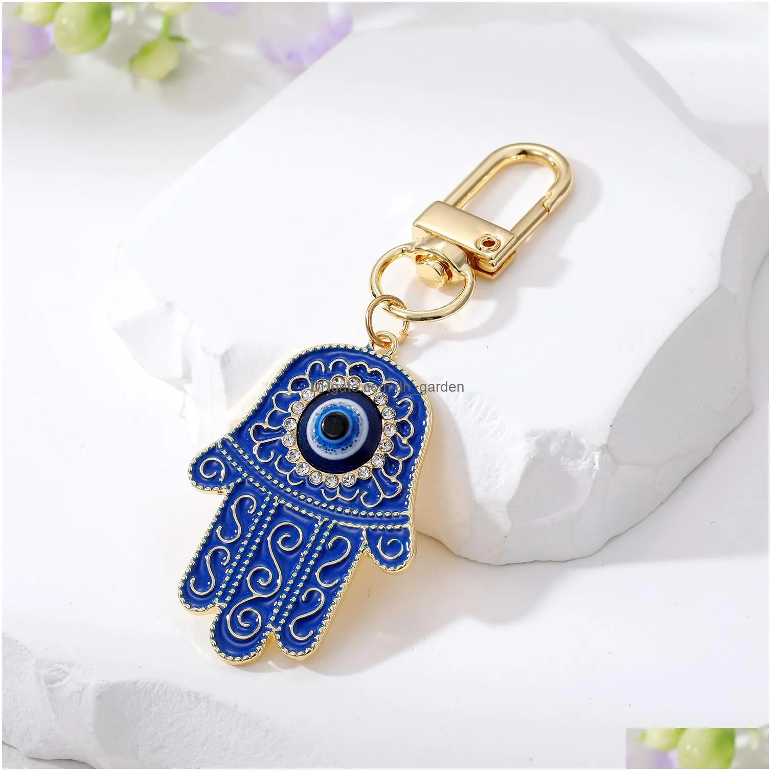 evil eye hamsa hand keychain key ring for women men hollow fatima hand blue eye bag car key accessories