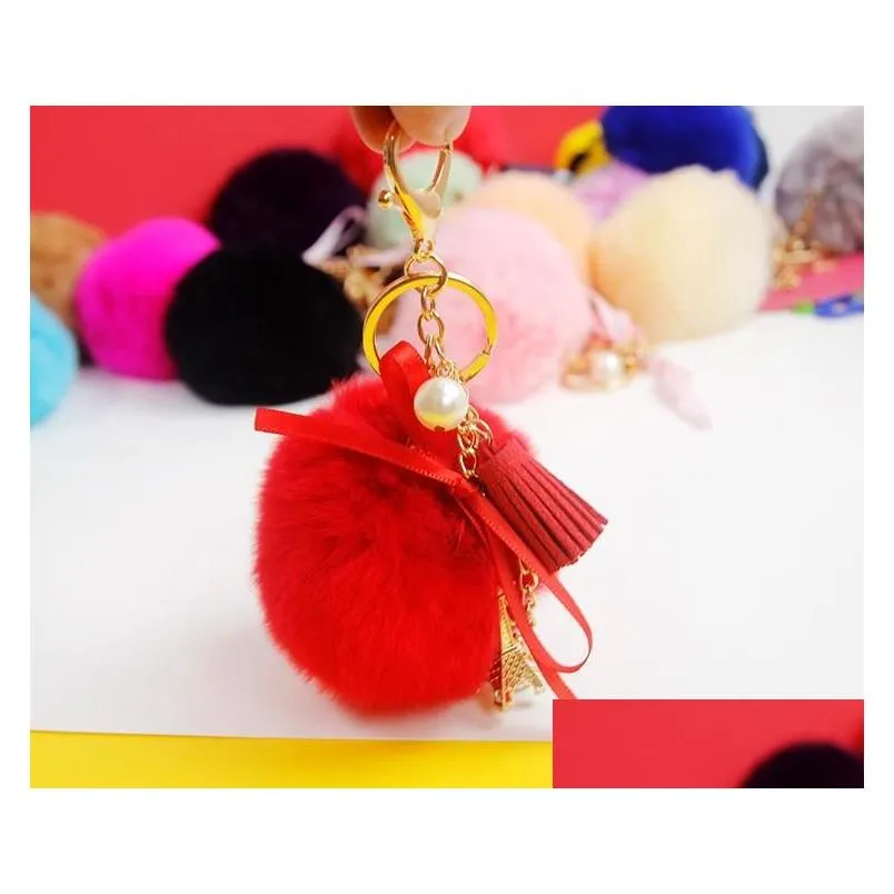 keychains 2021 lovely eiffel tower natural fur pompom furry ball keychain for women key chains bag imititated pearl pendent d521