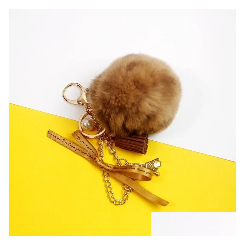 keychains 2021 lovely eiffel tower natural fur pompom furry ball keychain for women key chains bag imititated pearl pendent d521