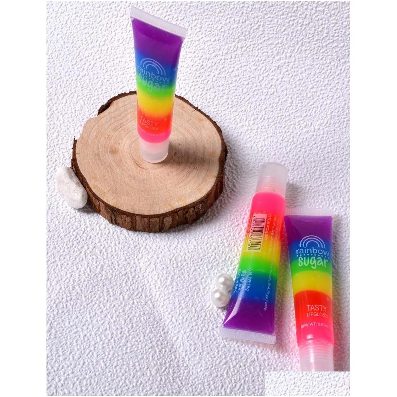 Newest Magic Waterproof Rainbow Sugar Tasty Lip Gloss Cosmetics Moisturizer Hydrating Transparent Lip Balm Fruit Scented Liquid