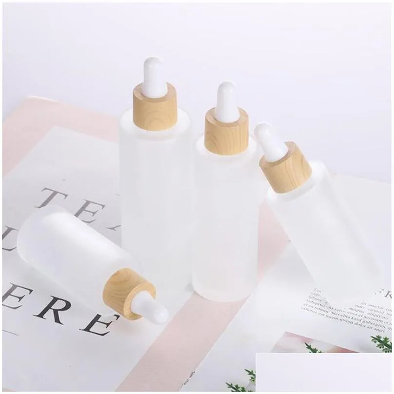 Packing Bottles Wholesale Frosted Essential Oil Glass Bottle Cosmetic Flat Shoder Dropper Bottles Container With Imitated Bamboo Cap 2 Dhjlf
