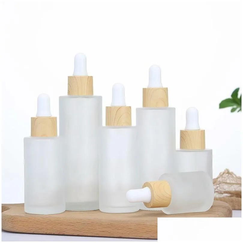 Packing Bottles Wholesale Frosted Essential Oil Glass Bottle Cosmetic Flat Shoder Dropper Bottles Container With Imitated Bamboo Cap 2 Dhjlf