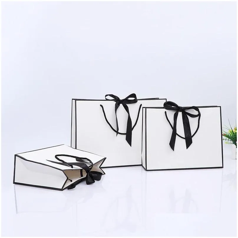 creative design large black border white kraft paper bag with handle wedding party favor bowknot paper gift bag lx01480
