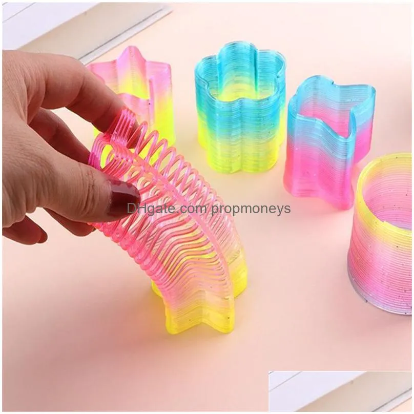 Novelty Games 24 Pcs/Lot 4.5Cm Mtishaped Magic Plastic Colorf Bounce Rainbow Transparent Spring Funny Classic Toy For Children 220325 Dhxgp