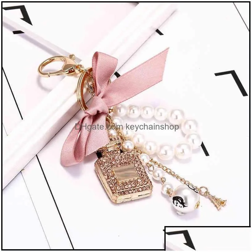 keychains fashion accessories creative handmade diy diamond per bottle alloy bow pearl luxury keychain purses charm pendant ys068 drop