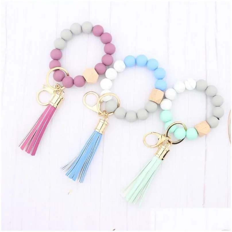 Party Favor Ups Fashion Sile Bead Bracelets Beech Tassel Key Chain Party Favor Pendant Leather Bracelet Womens Jewelry 14 Home Garden Dhmt1