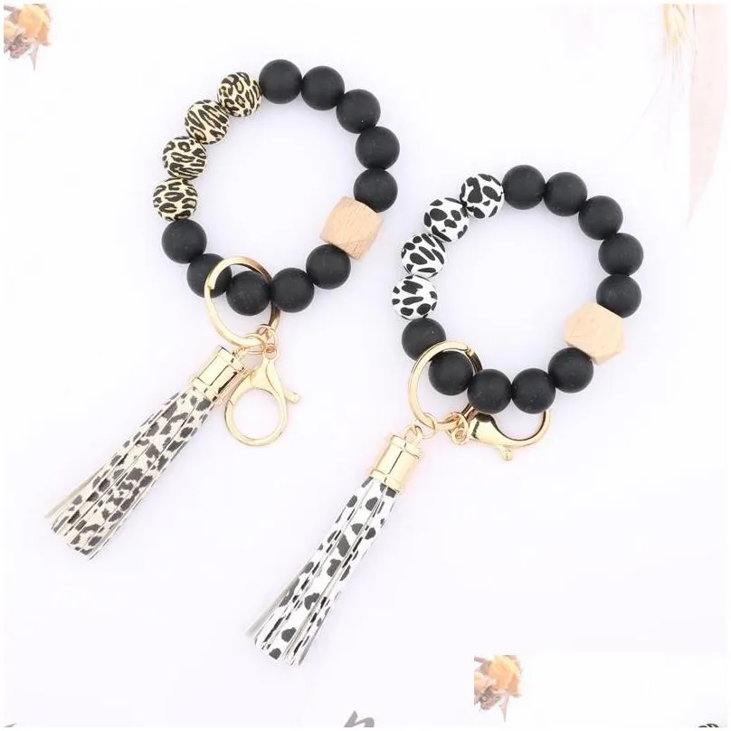 Party Favor Ups Fashion Sile Bead Bracelets Beech Tassel Key Chain Party Favor Pendant Leather Bracelet Womens Jewelry 14 Home Garden Dhmt1