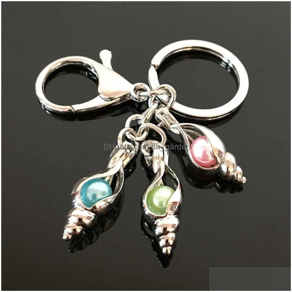 european and american feather pearl cage key ring can open hollow noctilucent volcanic stone pendant keyring