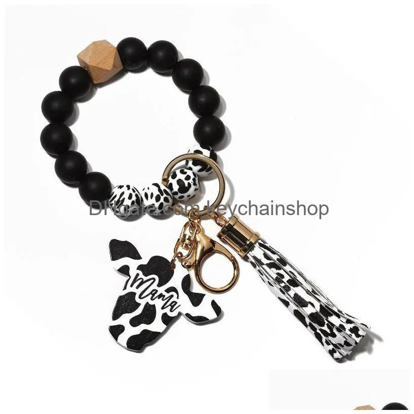 Party Favor Sile Cursive Cow Bead Bracelet Wood Disk Keychain Tassel Ox Head Wrist Key Ring Charm Pendant Accessory Wholesale Drop Del Dhcym