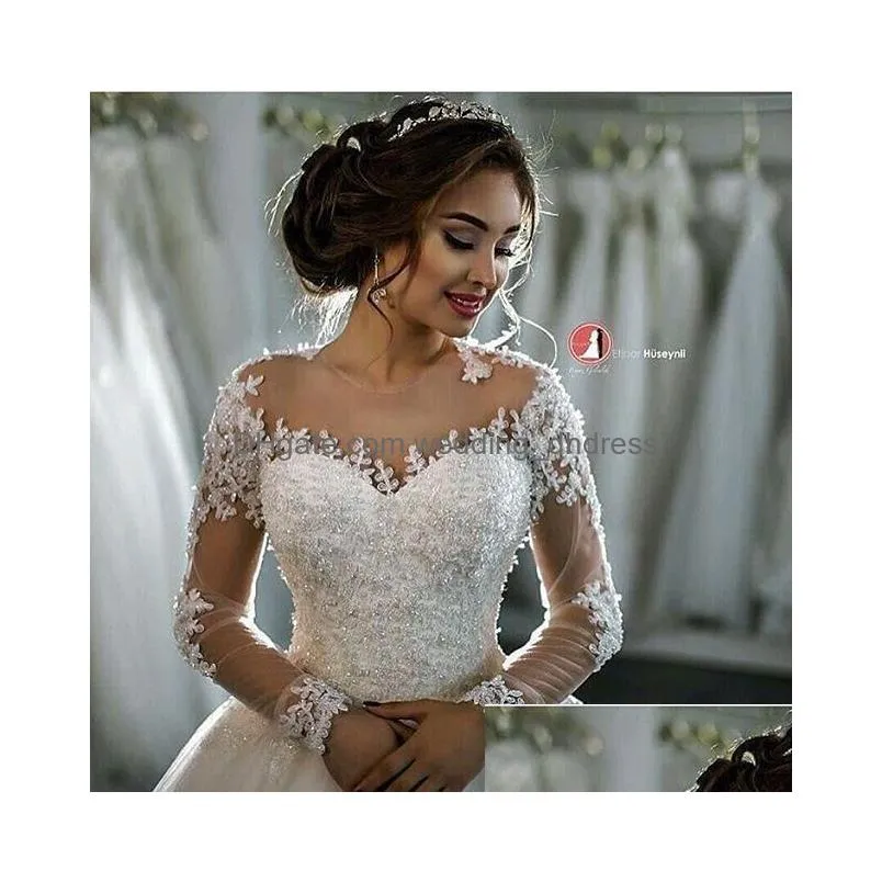 2022 a line wedding dresses fashion dubai elegant long sleeves sheer crew neck lace appliques beaded vestios de novia bridal gowns with buttons ba4150