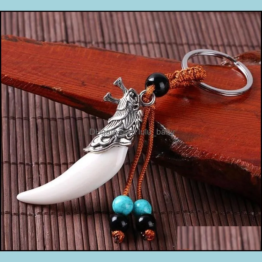 creative women and men imitation wolf tooth pendant keychains retro tassel keyrings charm car key accessories