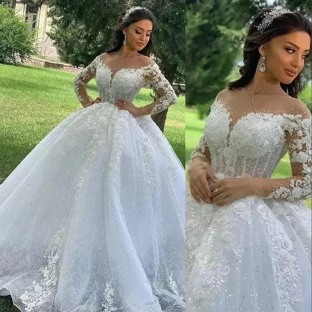 2022 Ball Gown Wedding Gowns Illusion Jewel Neck Long Sleeves Arabic Plus Size Charming Puffy Princess Lace Appliques Crystal Beads Sequined Bridal Party Dresses