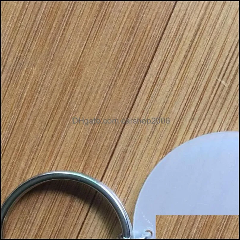 fashion keyring 4cm blank disc with 3cm suede tassel vinyl keyrings available clear acrylic disc tassel keychain pendant 207 r2