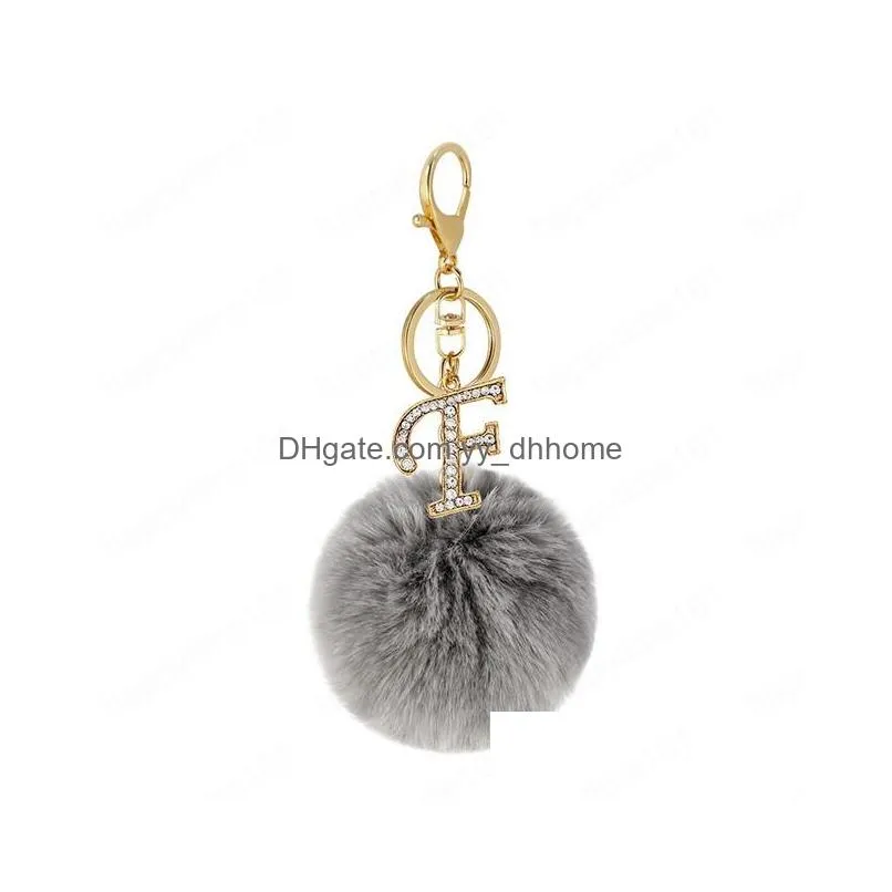 fashion grey pompom letter keychain golden english alphabet key chain with plush ball car handbag pendant ornaments small gift