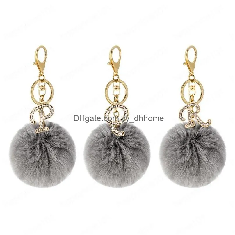 fashion grey pompom letter keychain golden english alphabet key chain with plush ball car handbag pendant ornaments small gift