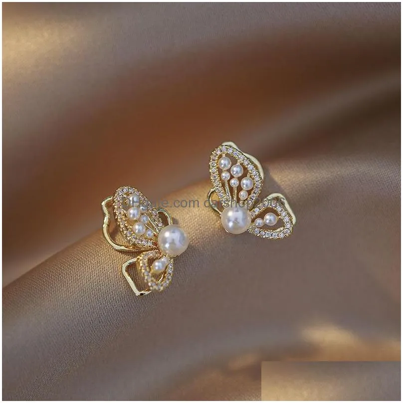 fashion jewelry symmetrical pearl butterfly earrings women faux pearl butterfly stud earrings