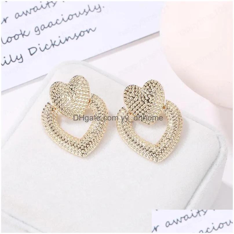  fashion jewelry heart earrings hollowed metal double peach heart stud earrings