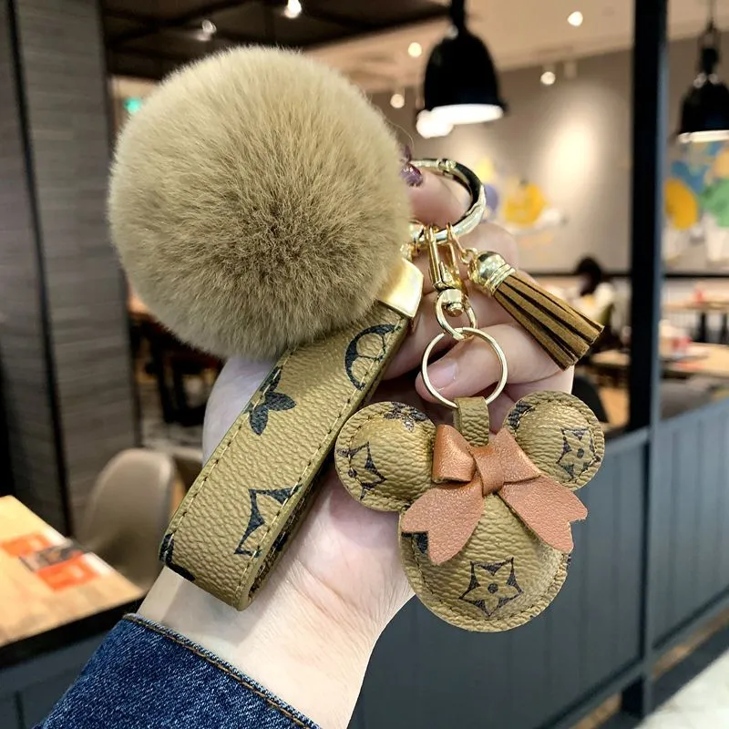 Designer keychain bear head leather fur ball pendant key chain bow car pendant metal fashion personality creative cute