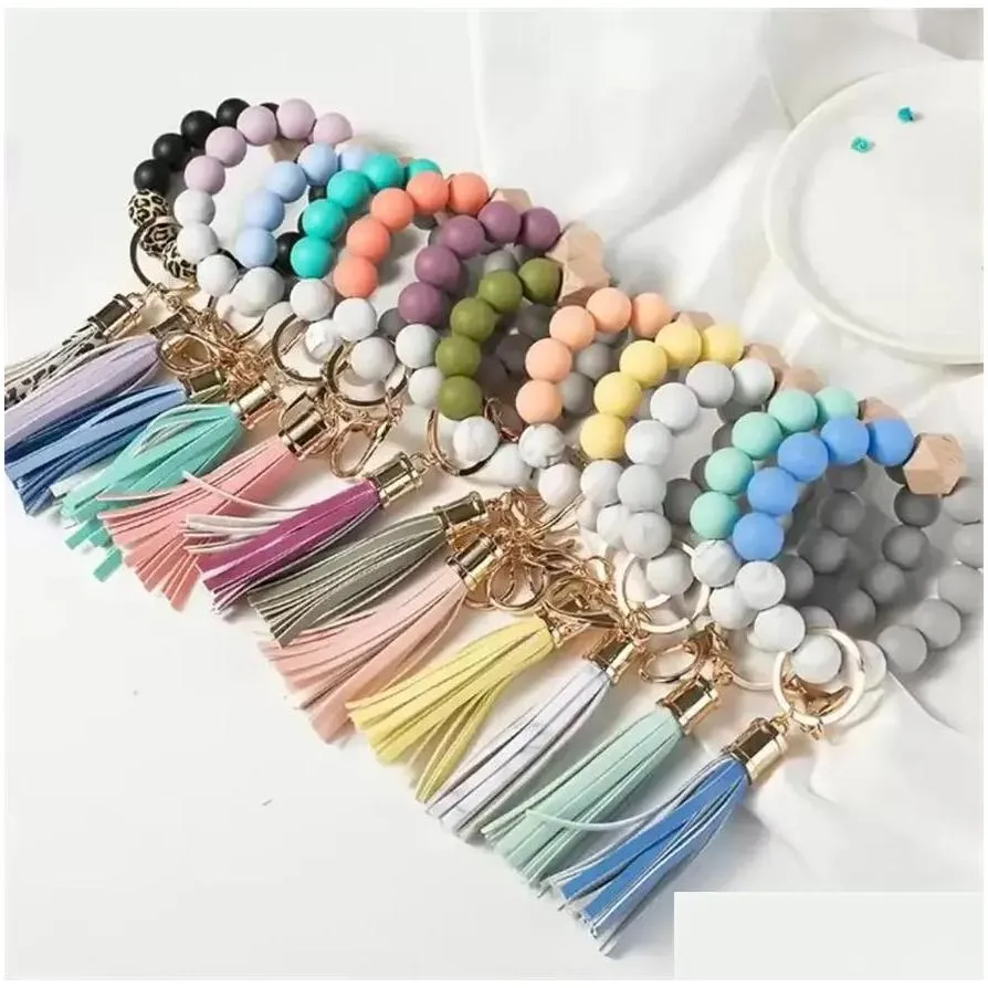 14 colors beaded bracelets jewelry wooden tassel bead string bracelet key chain food grade silicone beads women girl key ring wrist strap